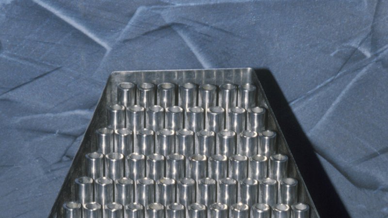 Model of a fuel assembly with cladding as used in the VVER 440 type reactors. The cross section shows the placement of all 126 fuel rods. (Source: ČEZ, a. s.)