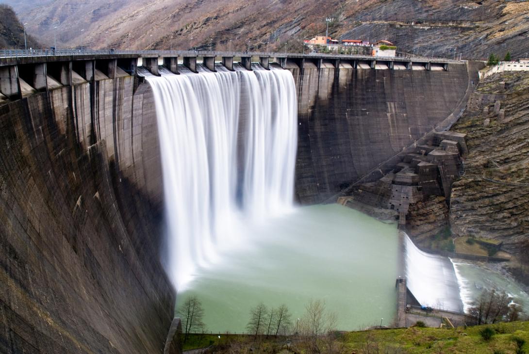 An artificial waterfall formed by water flowing through spillways over the edge of a dam when the water level is high. (Source: © fotola70 / stock.adobe.com) An artificial waterfall formed by water flowing through spillways over the edge of a dam when the water level is high. (Source: © fotola70 / stock.adobe.com)