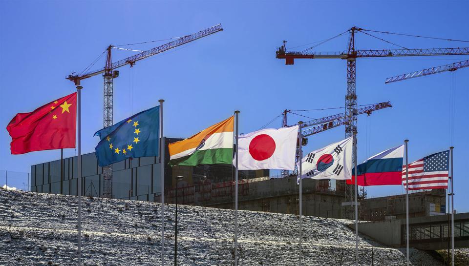 The flags of the seven ITER Members — China, the European Union, India, Japan, Korea, Russia, and the United States — fly over the worksite. (Credit © ITER Organization, http://www.iter.org/) The flags of the seven ITER Members — China, the European Union, India, Japan, Korea, Russia, and the United States — fly over the worksite. (Credit © ITER Organization, http://www.iter.org/)